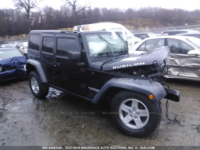 1J4BA6H13BL599560 - 2011 JEEP WRANGLER UNLIMITE RUBICON BLACK photo 1