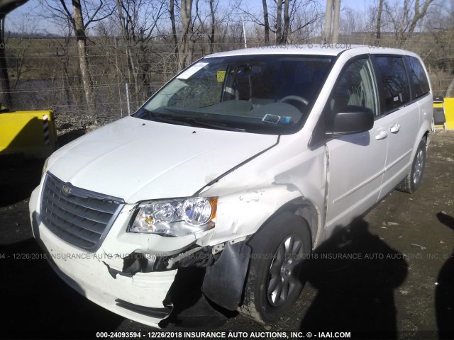 2A4RR4DEXAR103972 - 2010 CHRYSLER TOWN & COUNTRY LX YELLOW photo 2