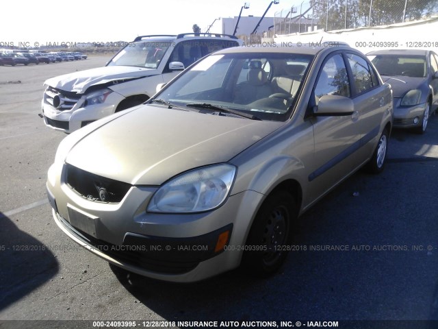 KNADE223896440738 - 2009 KIA RIO LX/SX GOLD photo 2