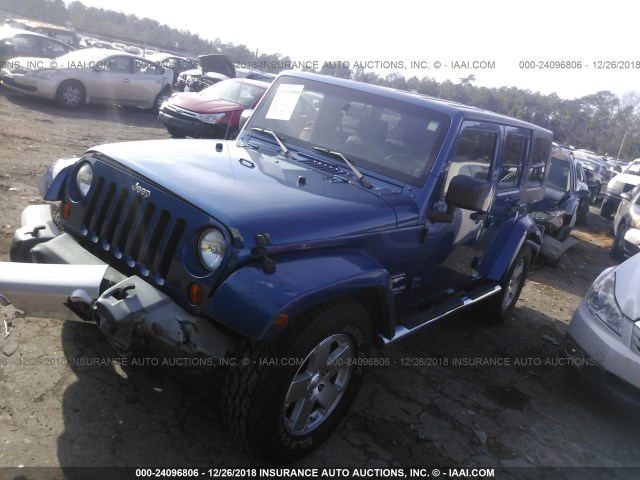 1J4GB59139L747213 - 2009 JEEP WRANGLER UNLIMITE SAHARA BLUE photo 2