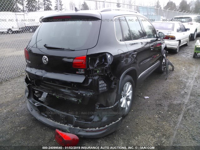 WVGSV7AX1HK005606 - 2017 VOLKSWAGEN TIGUAN WOLFSBURG BLACK photo 4