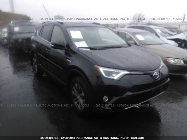 JTMRJREV4GD021434 - 2016 TOYOTA RAV4 HV XLE BLACK photo 1