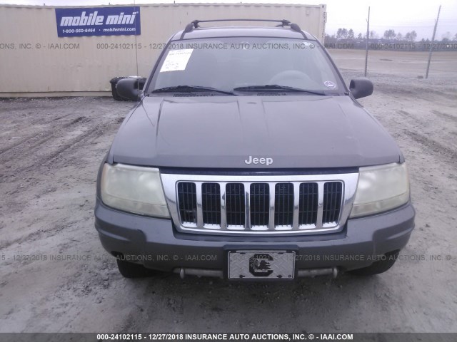 1J8GW68J84C399136 - 2004 JEEP GRAND CHEROKEE OVERLAND GRAY photo 6