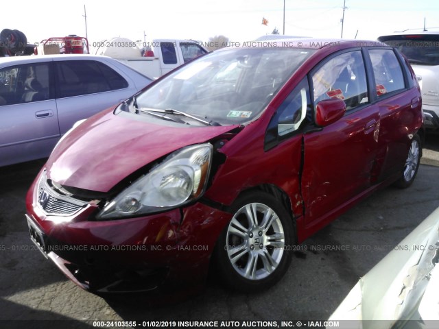 JHMGE88449S014411 - 2009 HONDA FIT SPORT RED photo 2