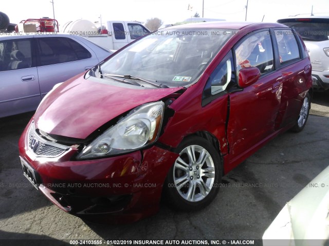 JHMGE88449S014411 - 2009 HONDA FIT SPORT RED photo 6