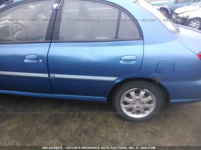 KNADC125646293961 - 2004 KIA RIO BLUE photo 6