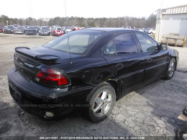 1G2NV52E5YC553934 - 2000 PONTIAC GRAND AM GT1 BLACK photo 4