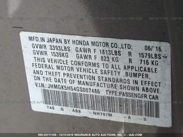 JHMGK5H54GS007486 - 2016 HONDA FIT LX GRAY photo 9