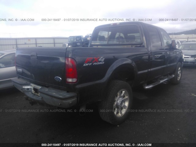 1FTWW31Y05EB35522 - 2005 FORD F350 SRW SUPER DUTY BLACK photo 4