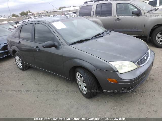 1FAFP34N35W310960 - 2005 FORD FOCUS ZX4 GRAY photo 1