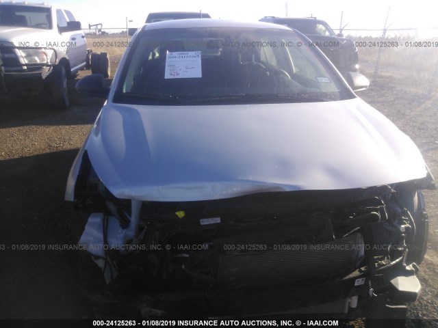 3KPA25AB3JE094315 - 2018 KIA RIO LX/S SILVER photo 6