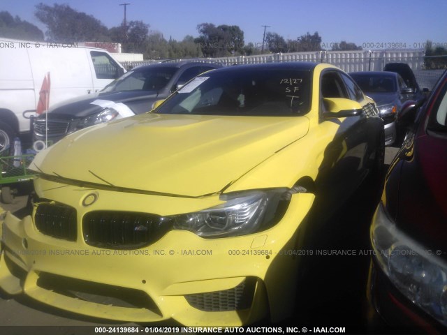 WBS3R9C3XHA014452 - 2017 BMW M4 YELLOW photo 2