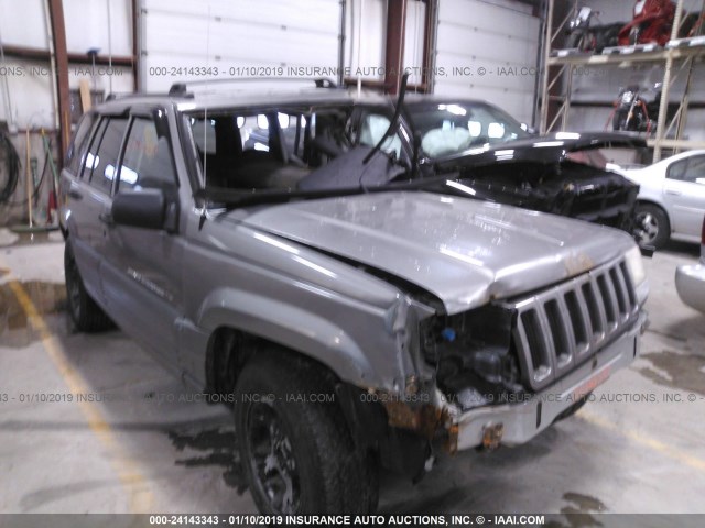 1J4GZ58S3VC741394 - 1997 JEEP GRAND CHEROKEE LAREDO/TSI GRAY photo 1