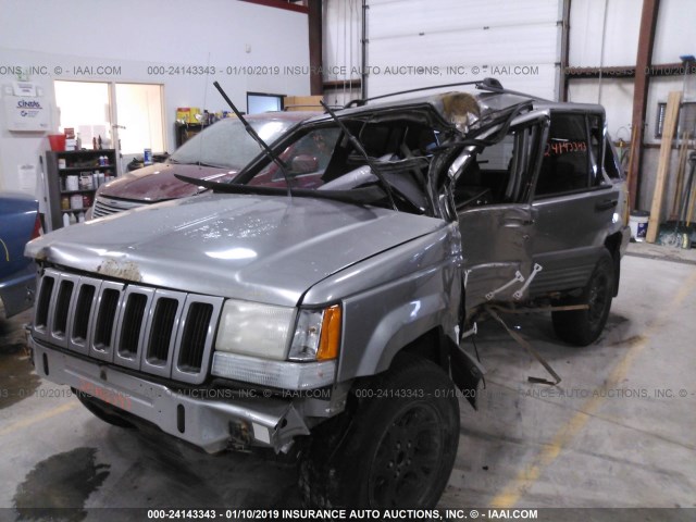 1J4GZ58S3VC741394 - 1997 JEEP GRAND CHEROKEE LAREDO/TSI GRAY photo 2