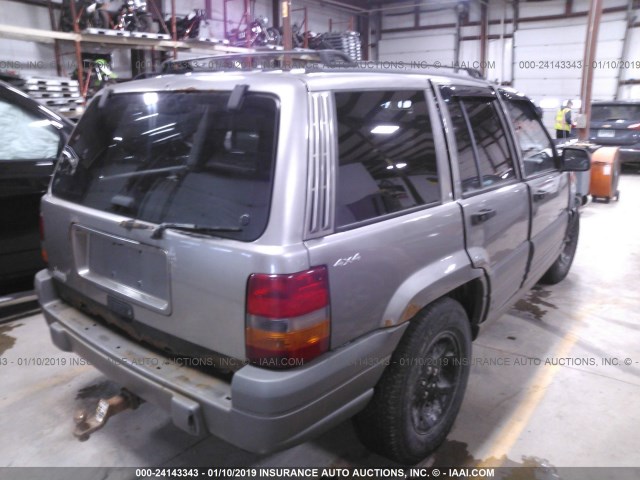 1J4GZ58S3VC741394 - 1997 JEEP GRAND CHEROKEE LAREDO/TSI GRAY photo 4