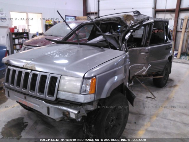 1J4GZ58S3VC741394 - 1997 JEEP GRAND CHEROKEE LAREDO/TSI GRAY photo 6