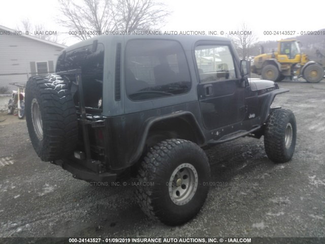 1J4FA59S6YP723342 - 2000 JEEP WRANGLER / TJ SAHARA BLACK photo 4