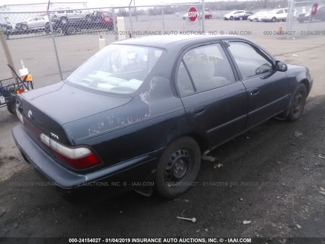 1NXBB02E8VZ619159 - 1997 TOYOTA COROLLA DX GREEN photo 4