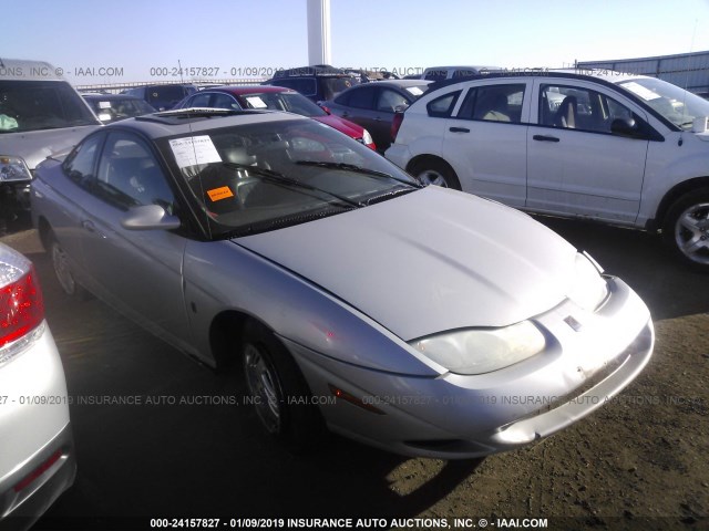 1G8ZY12771Z216211 - 2001 SATURN SC2 SILVER photo 1