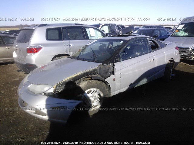 1G8ZY12771Z216211 - 2001 SATURN SC2 SILVER photo 2