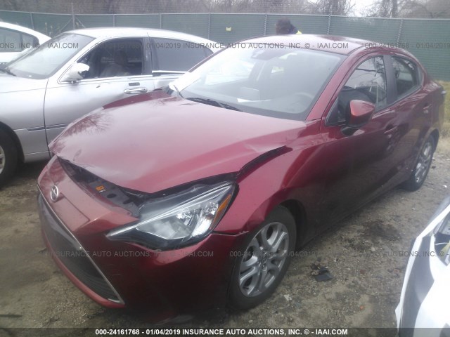 3MYDLBZV2GY114246 - 2016 TOYOTA SCION IA RED photo 2