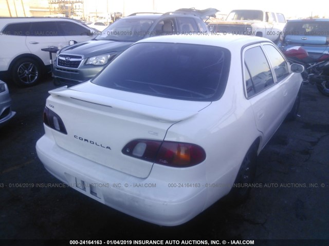 1NXBR12E5YZ336479 - 2000 TOYOTA COROLLA VE/CE/LE WHITE photo 4