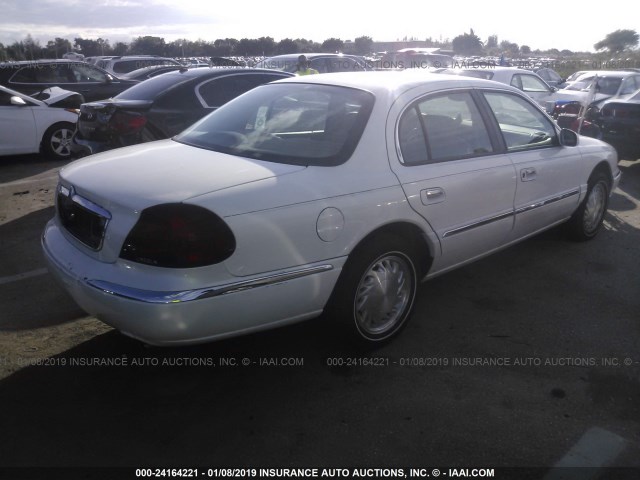 1LNFM97V9WY633719 - 1998 LINCOLN CONTINENTAL  WHITE photo 4