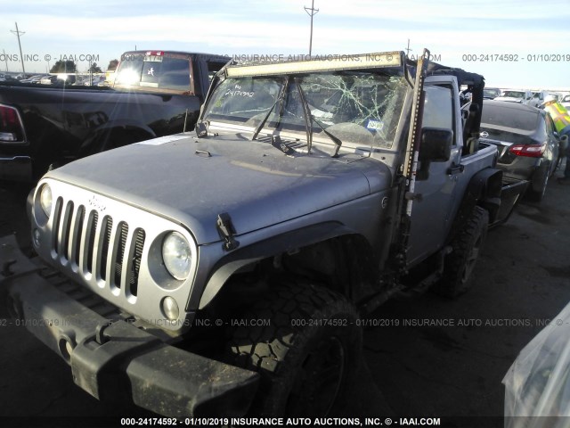 1C4AJWAG4FL598424 - 2015 JEEP WRANGLER SPORT SILVER photo 2