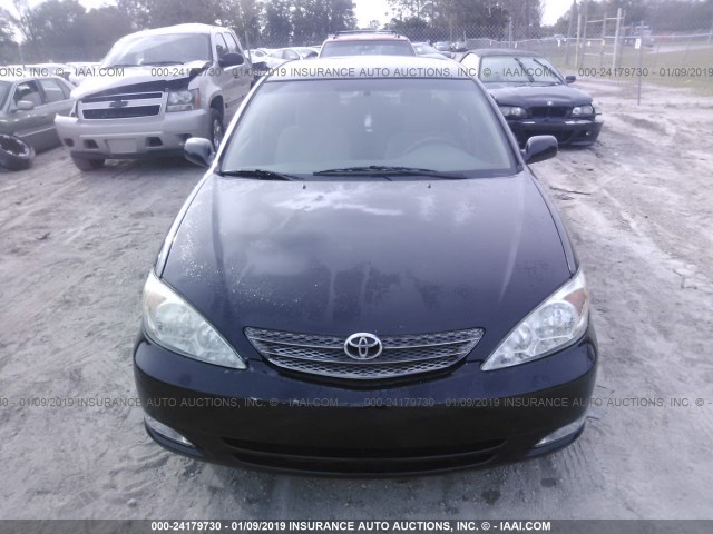 4T1BE32K02U004518 - 2002 TOYOTA CAMRY LE/XLE/SE BLACK photo 6