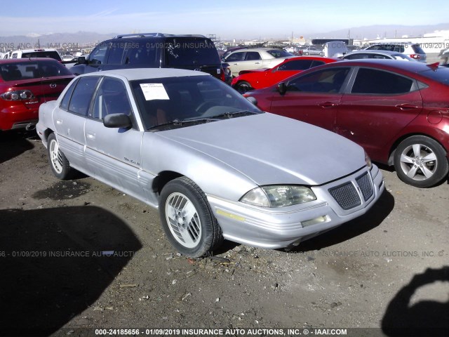 1G2NE54N5NC279093 - 1992 PONTIAC GRAND AM SE SILVER photo 1