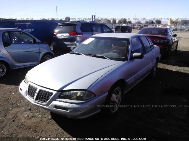 1G2NE54N5NC279093 - 1992 PONTIAC GRAND AM SE SILVER photo 2