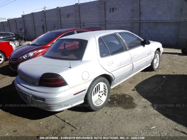 1G2NE54N5NC279093 - 1992 PONTIAC GRAND AM SE SILVER photo 4