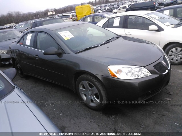 1G2ZG58B574203446 - 2007 PONTIAC G6 SE GRAY photo 1