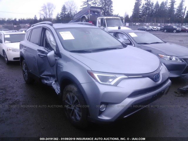 JTMRJREV2JD238424 - 2018 TOYOTA RAV4 HV LE PLUS/XLE GRAY photo 1