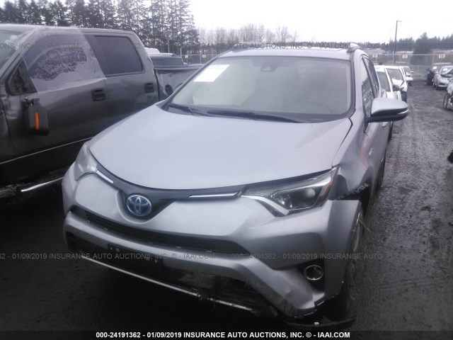 JTMRJREV2JD238424 - 2018 TOYOTA RAV4 HV LE PLUS/XLE GRAY photo 2