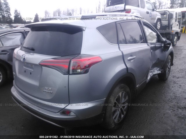 JTMRJREV2JD238424 - 2018 TOYOTA RAV4 HV LE PLUS/XLE GRAY photo 4