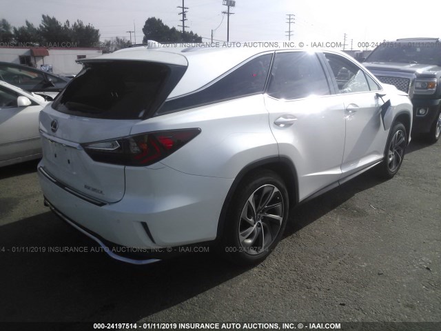 JTJGZKCA3J2008164 - 2018 LEXUS RX 350 L WHITE photo 4