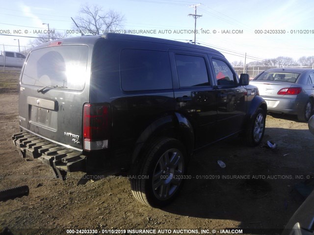 1D4PT4GX5BW606686 - 2011 DODGE NITRO HEAT BLACK photo 4