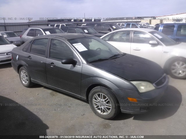 1FAFP34N25W272329 - 2005 FORD FOCUS ZX4 GRAY photo 1