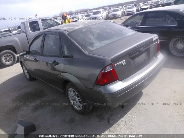 1FAFP34N25W272329 - 2005 FORD FOCUS ZX4 GRAY photo 3