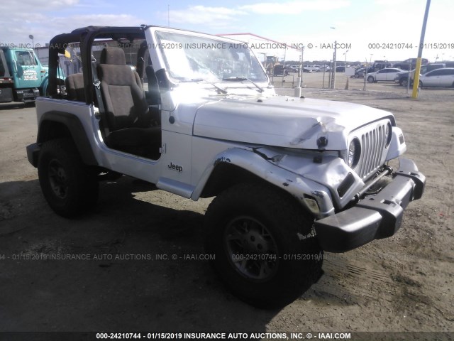 1J4FA39S64P702697 - 2004 JEEP WRANGLER X SILVER photo 1