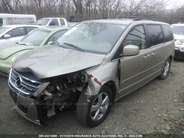 2V8HW34199R564081 - 2009 VOLKSWAGEN ROUTAN SE BEIGE photo 2