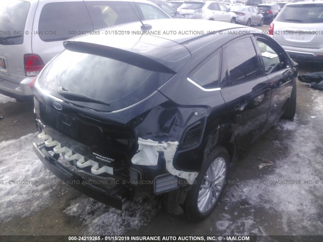 1FADP3N29GL285322 - 2016 FORD FOCUS TITANIUM BLACK photo 4