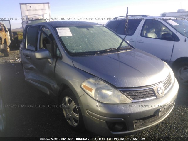 3N1BC13E79L384195 - 2009 NISSAN VERSA S/SL GRAY photo 1