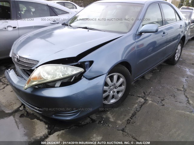 JTDBE30K830160175 - 2003 TOYOTA CAMRY LE/XLE Blau Foto 2