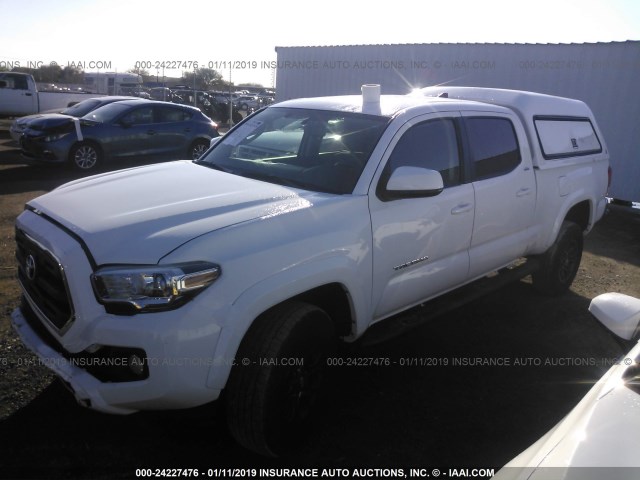 3TMDZ5BN3HM020748 - 2017 TOYOTA TACOMA DBL CAB/SR5/TRD SPORT/OR WHITE photo 2