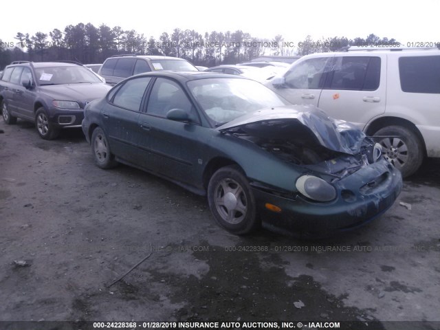 1FAFP53S6XA239451 - 1999 FORD TAURUS SE/COMFORT/SPORT GREEN photo 1