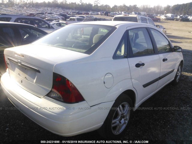 1FAFP33P51W253142 - 2001 FORD FOCUS LX WHITE photo 4