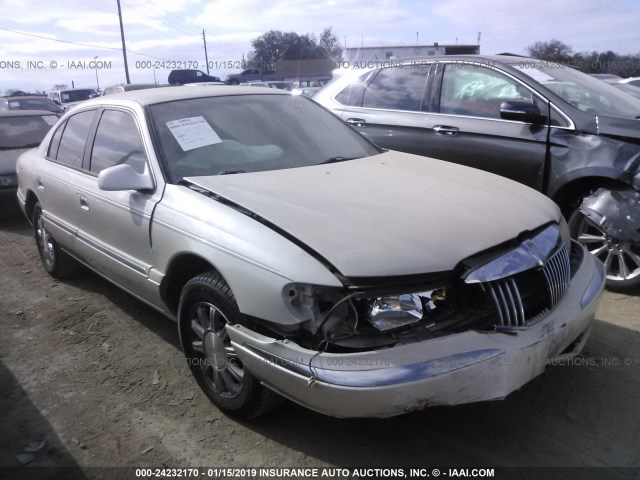 1LNHM97V41Y730196 - 2001 LINCOLN CONTINENTAL  GOLD photo 1