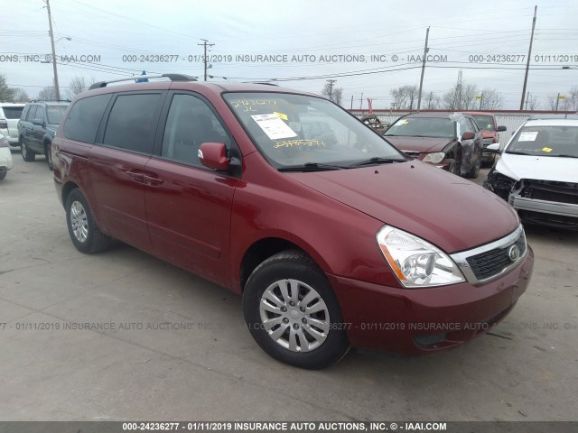 KNDMG4C77C6499409 - 2012 KIA SEDONA LX RED photo 1